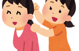 肩たたく女